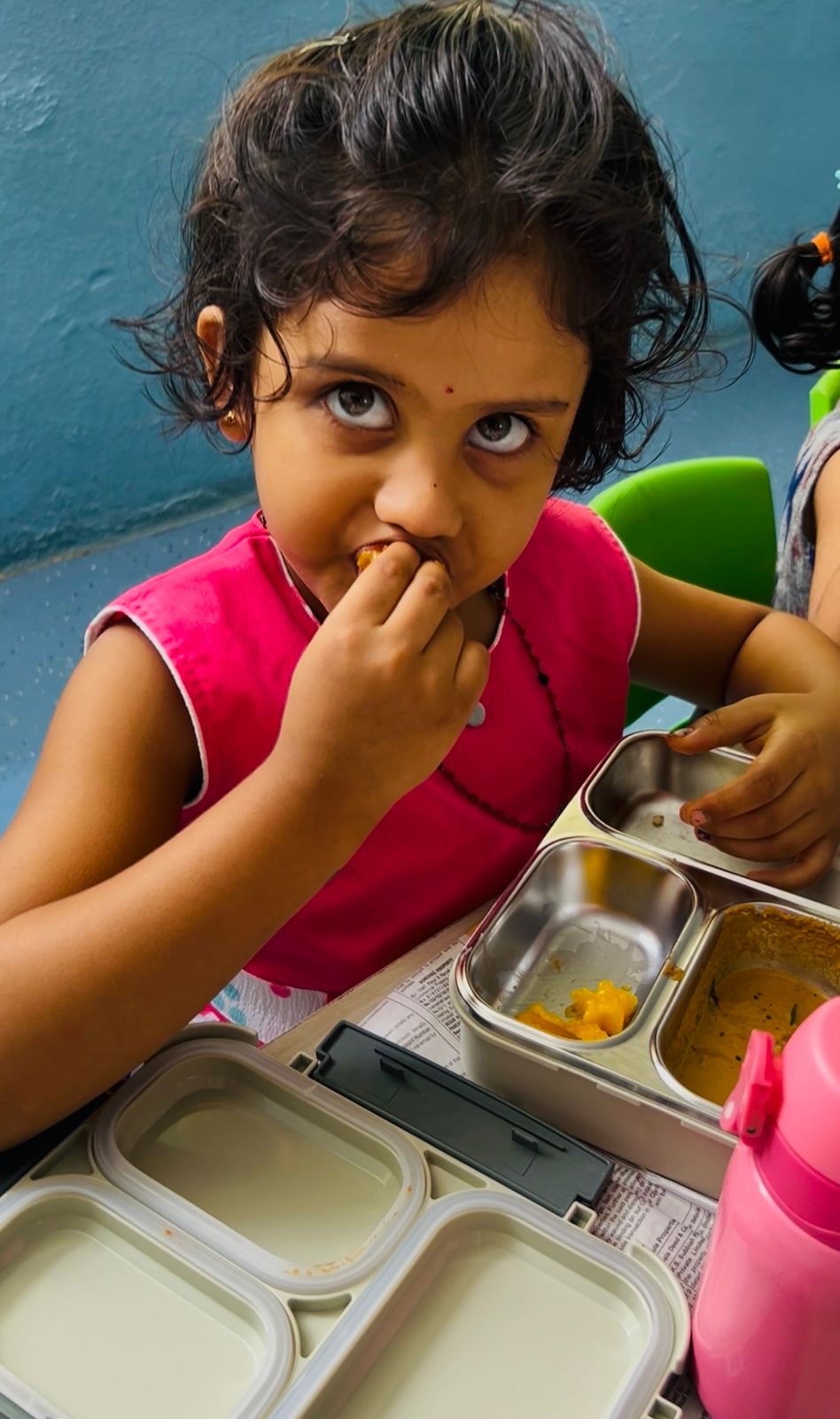 Happy child with a big smile at lunchtime